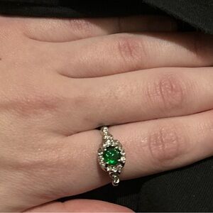 Brand new faux emerald ring with faux diamonds
